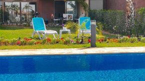 Appartement de Luxe avec Jardin Vue sur la Piscine Golf Securise 24h sur 24 a 5 Minutes de l Aeroport